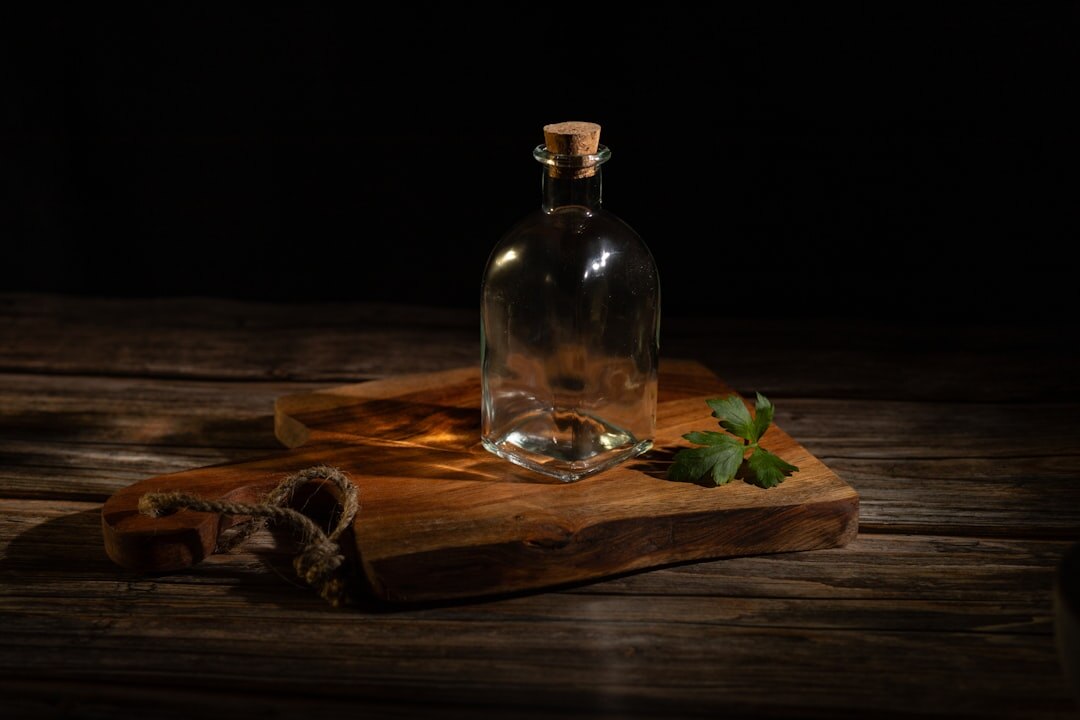Product photography of local olive oil bottles on a wooden surface