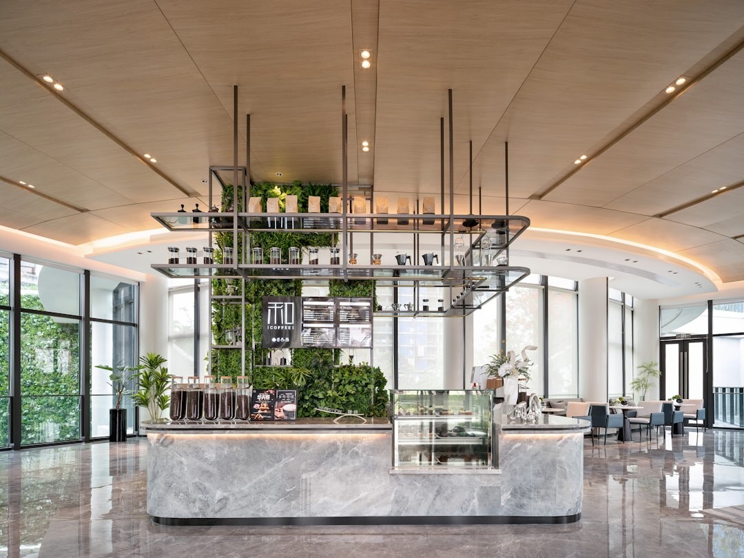Interior of a stylish new cafe with coffee cups on a marble counter