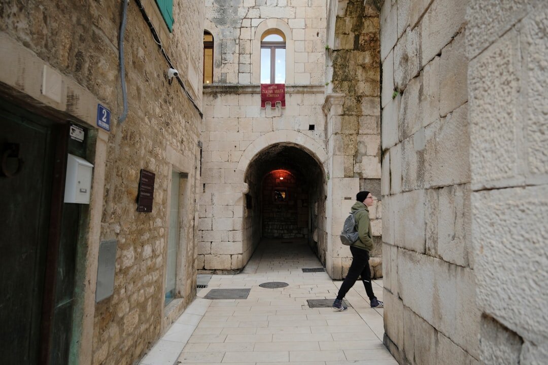 Narrow stone street inside Split old town in the afternoon