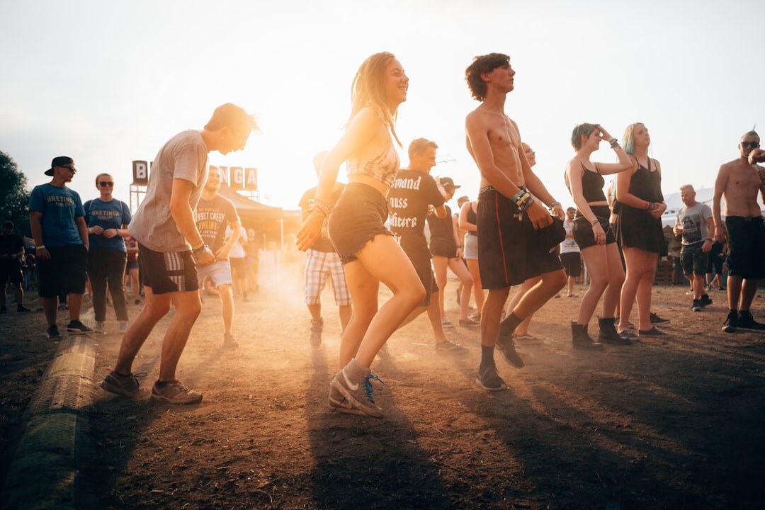 Crowd enjoying an outdoor summer festival at night