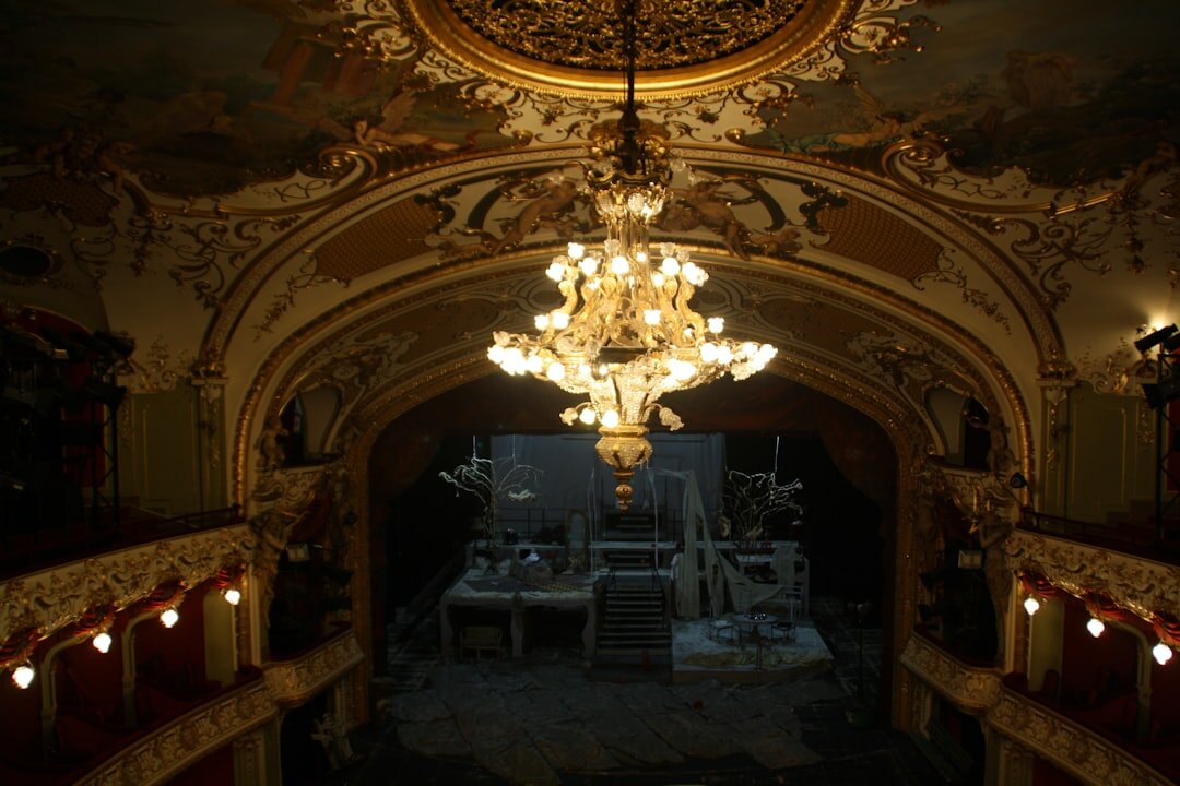 Interior of a historic theatre with ornate balconies